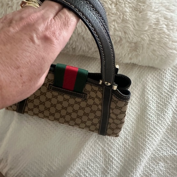 Gucci is authentic and brand new. The serial number is the last picture - Picture 3 of 13